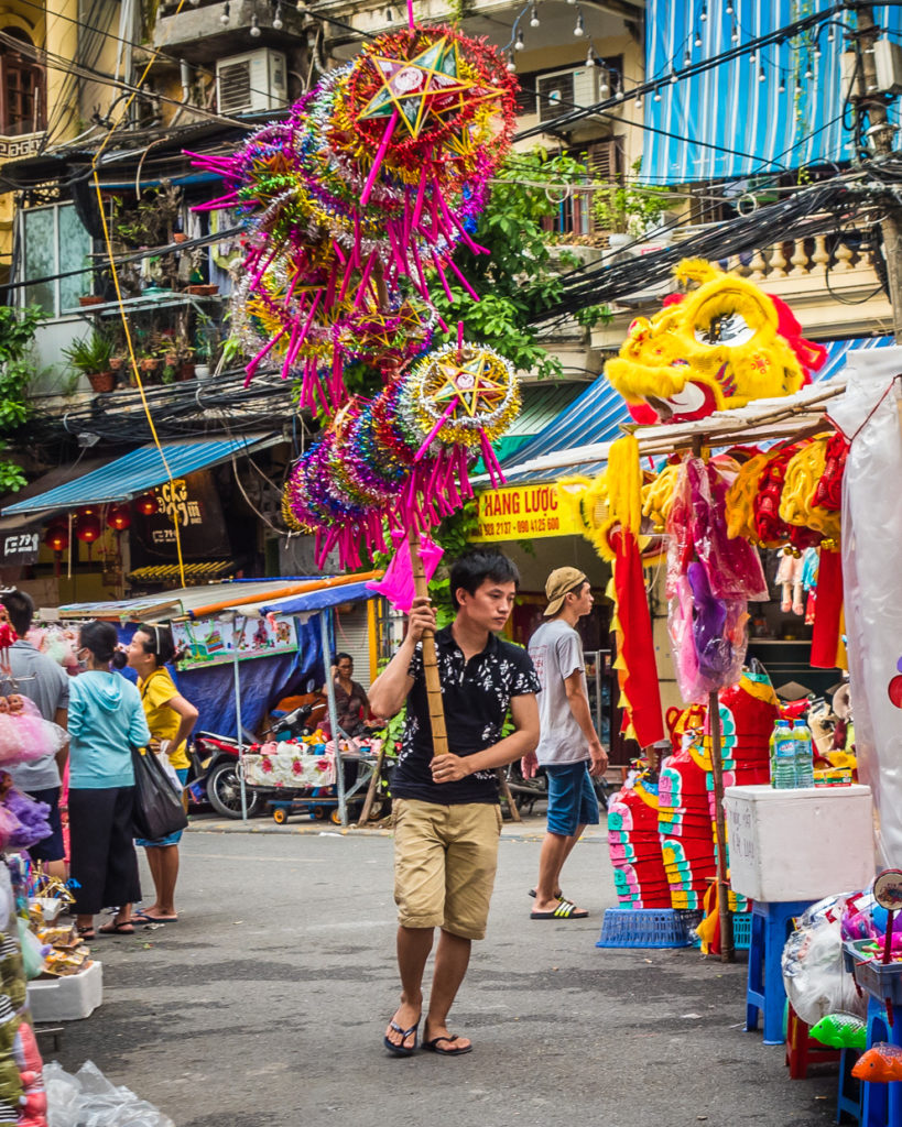 Street Vendor selling colorful stars
