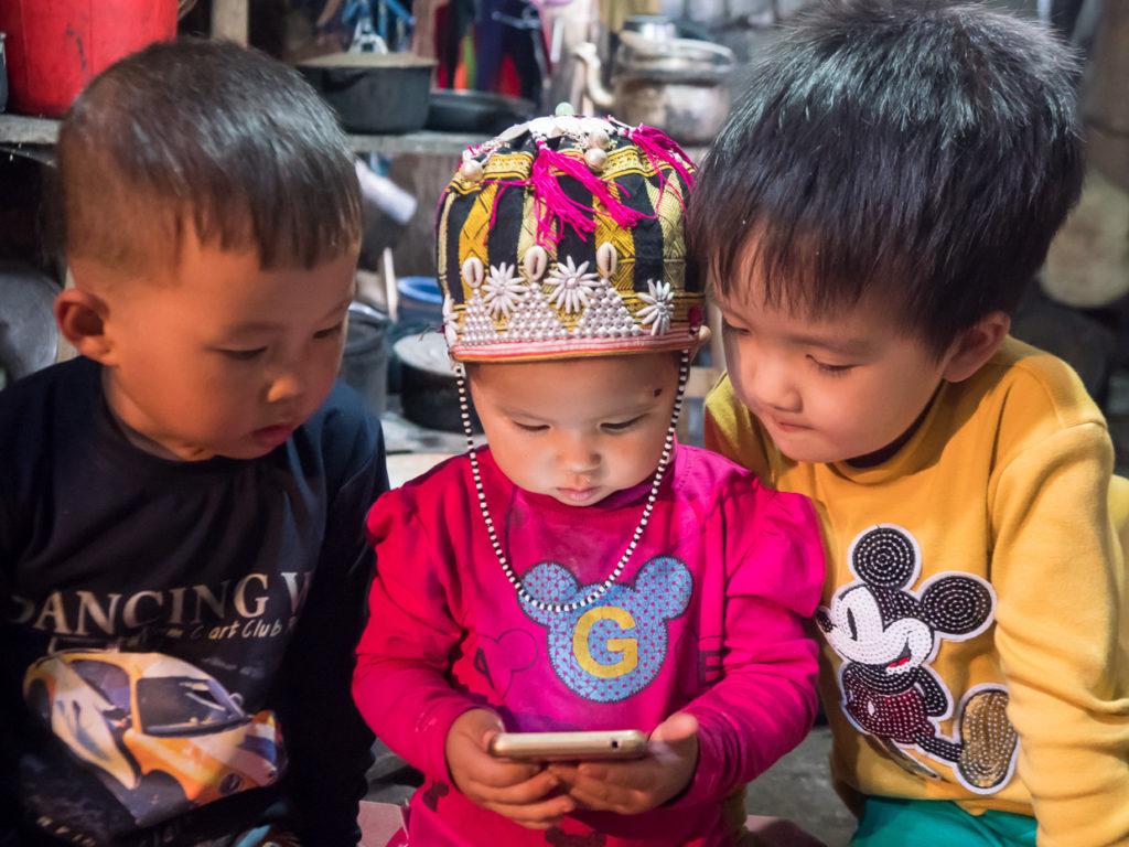 SaPa Tribal Children Looking At Mobile Phone Screen Where The Past Meets The Future