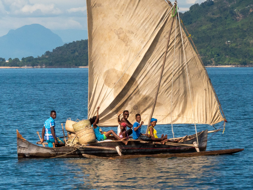 People Smiling From Traditional Sailboat Nosy Be Madagascar
