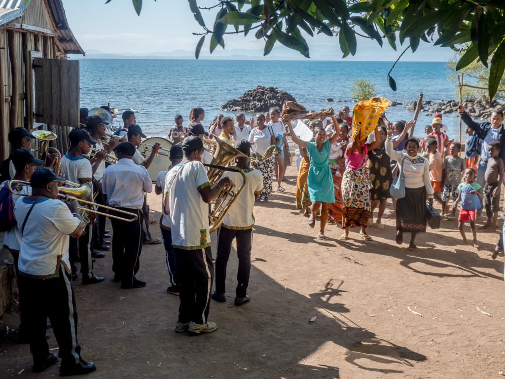 Band Playing On Beach While Villagers Dance In Nosy Komba