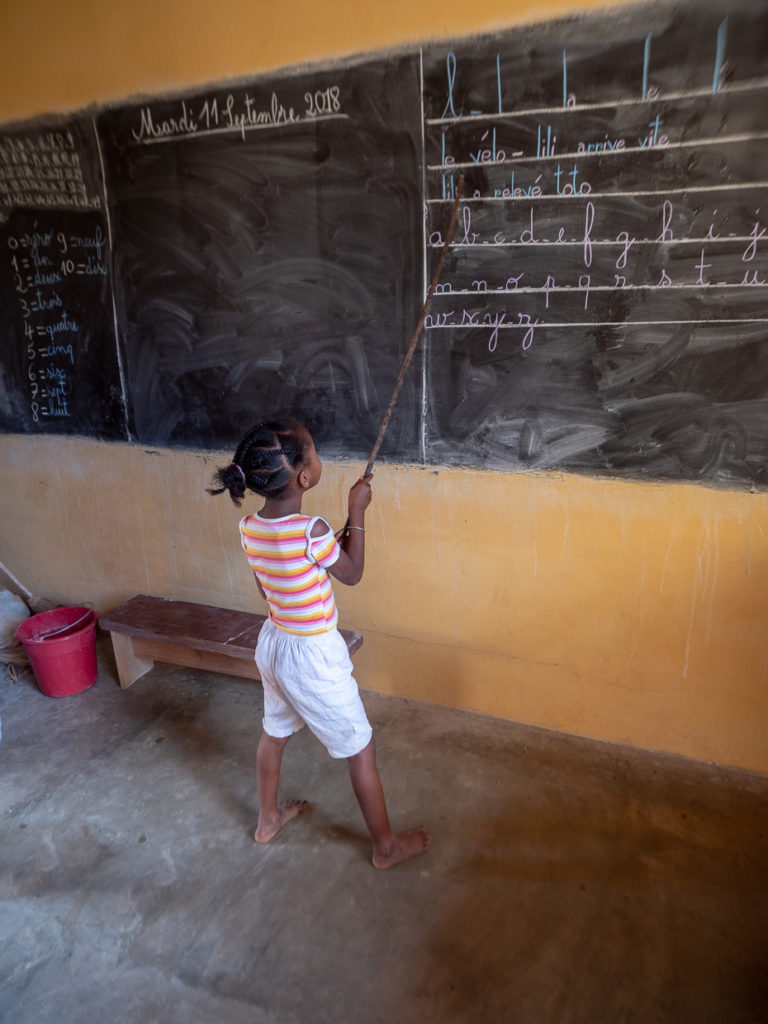 School Girl At Chalk Board Nosy Komba, Madgascar