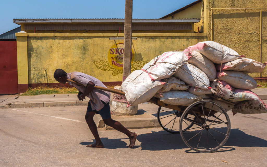 Man Pulling Cart Ladden With Sacks At Mahajanga