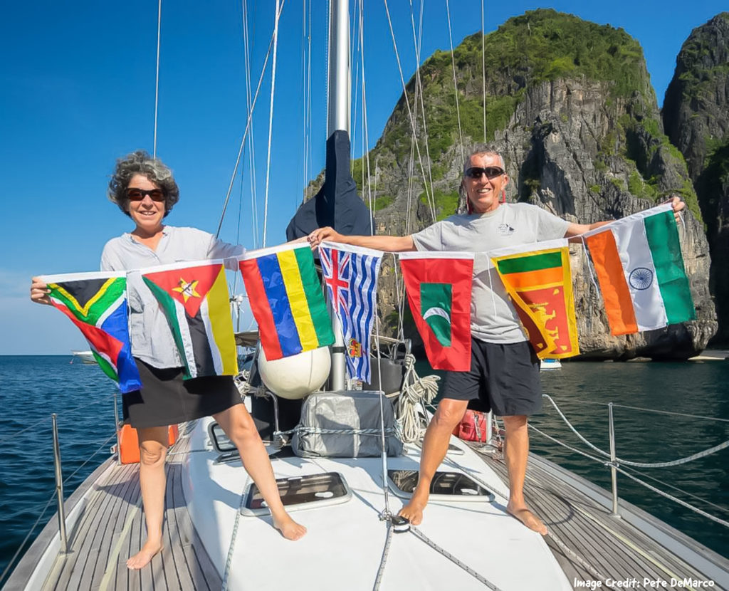 Sailboat Crew Holding Flags