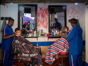 Man Smiling In Comuna 13 Barber Shop