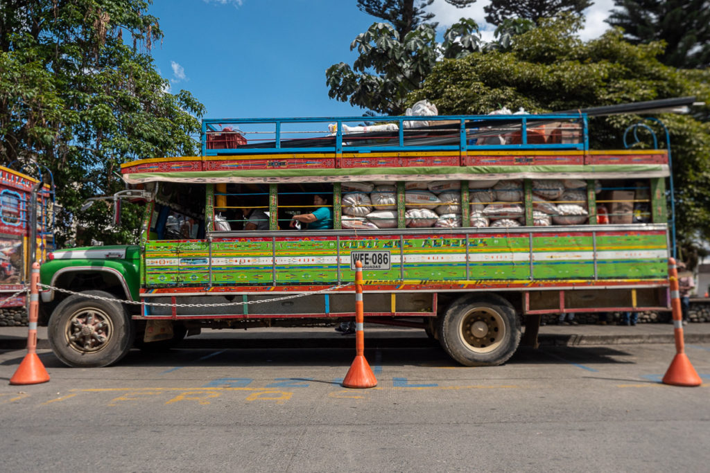 Shipping Coffee In Colorful Bus To Market From Aguadas