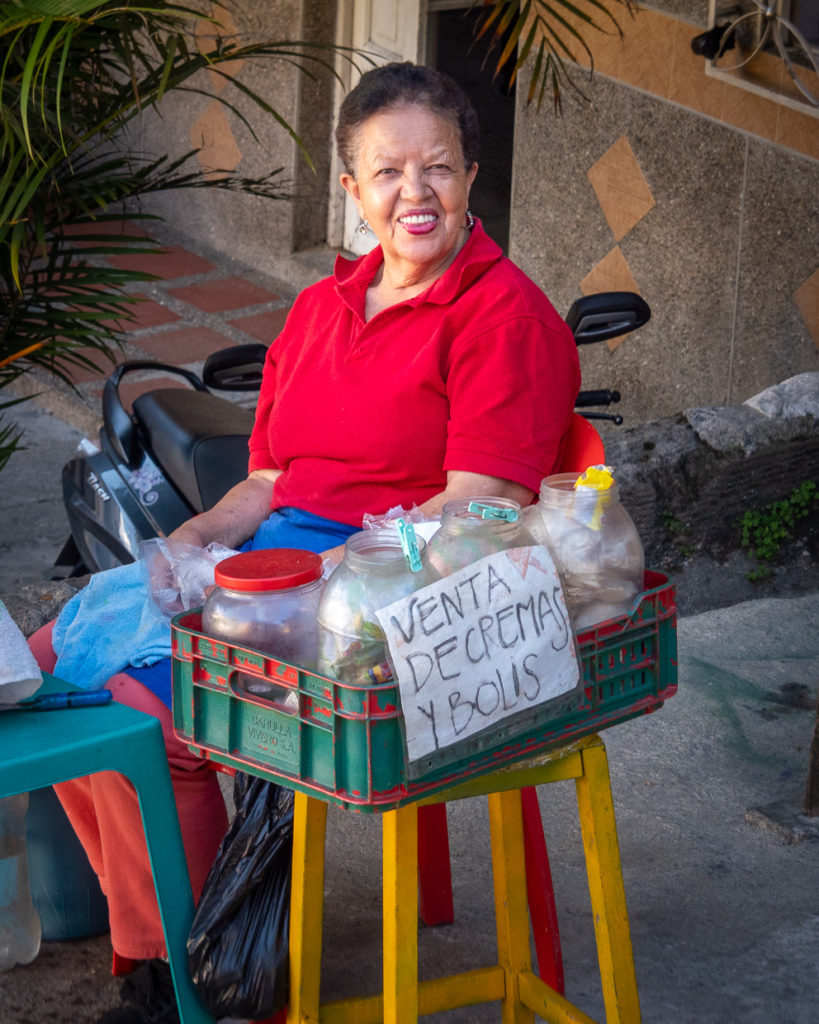 Welcoming Street Vendor In Medellín