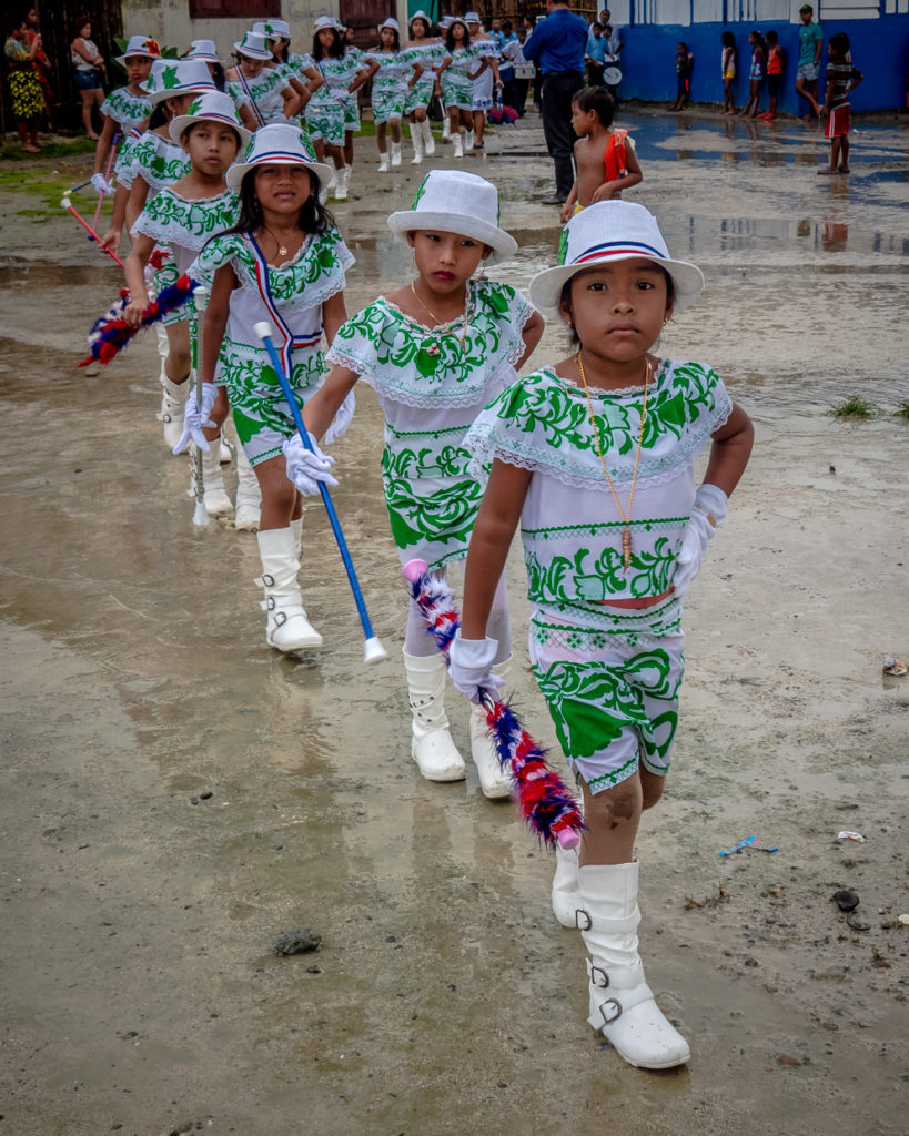 Guna Children In Panamanian Costume With Batons