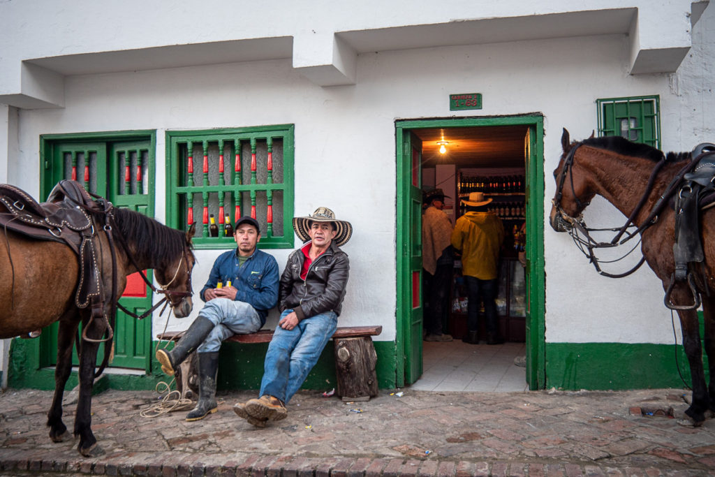 Mongui Cowboys with horses outside local pub